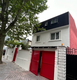 Réalisation d’un ravalement peinture façade de maison à Pantin